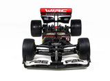 WIRC F26 chassis front view showing front wing, suspension, and rear wing