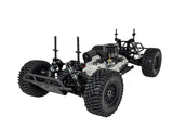 WIRC ST8 chassis three-quarter view showing nitro engine, fuel tank, and front suspension