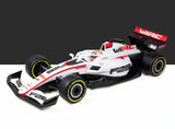 WIRC F26 1/10 electric Formula car - front three-quarter view of white and red painted bodyshell with driver figure